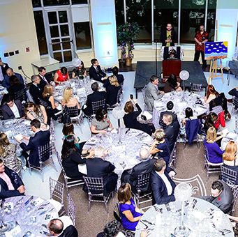 An overhead photograph of the tables and people at one of the CLK Gala evetns